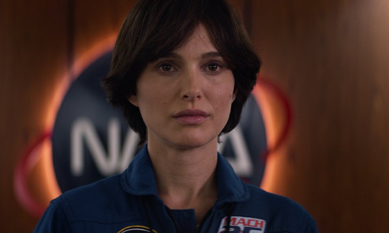 Lucy Cola (Natalie Portman) is an astronaut with an unhealthy obsession with a co-worker in Noah Hawley’s Lucy in the Sky, which is loosely based on the 2007 incident in which an astro- naut attacked an Air Force officer she saw as a romantic rival. 