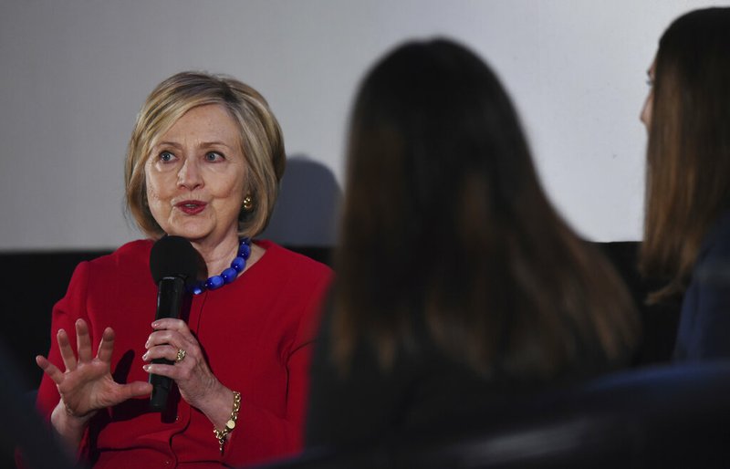 Former Secretary of State Hillary Clinton answers a question posed by student journalists during the Trailblazing Women of Park Ridge event in Park Ridge, Ill., Friday, Oct. 11, 2019. (Joe Lewnard/Daily Herald via AP)