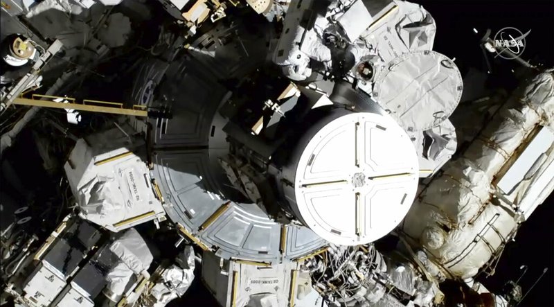 In this photo provided by NASA astronauts Christina Koch and Jessica Meir exits the International Space Station on Friday, Oct. 18, 2019. The world’s first female spacewalking team is making history high above Earth. This is the first time in a half-century of spacewalking that a woman floated out without a male crewmate. Their job is to fix a broken part of the station’s solar power network.(NASA via AP)