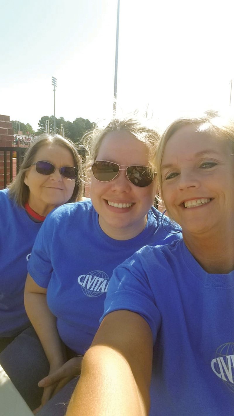 From left are outgoing Searcy Civitan president Janice Collins, incoming president Ashley Vaughan and past president Michela Fowler volunteering at the Area 6 Special Olympics Arkansas Spring Games at Harding University on April 27.