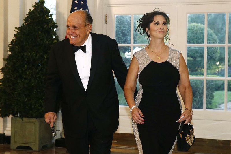 Rudy Giuliani, an attorney for President Donald Trump, and Maria Ryan arrive for a State Dinner with Australian Prime Minister Scott Morrison and President Donald Trump at the White House, Friday, Sept. 20, 2019, in Washington.