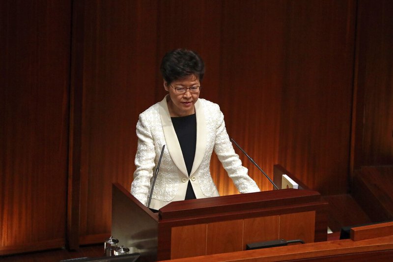 Hong Kong Chief Executive Carrie Lam speaks as she attends a question and answer session with lawmakers at the chamber of the Legislative Council in Hong Kong, Thursday, Oct. 17, 2019.
