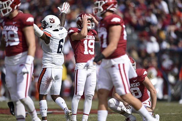 Arkansas kicker Connor Limpert (19) reacts after missing a field goal during a game against Auburn on Saturday, Oct. 19, 2019, in Fayetteville. 