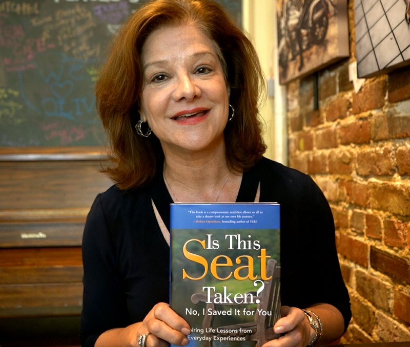 Kristin Kaufman discusses the three books in her "Is This Seat Taken?" series. - Photo and Video by Cassidy Kendall of The Sentinel-Record