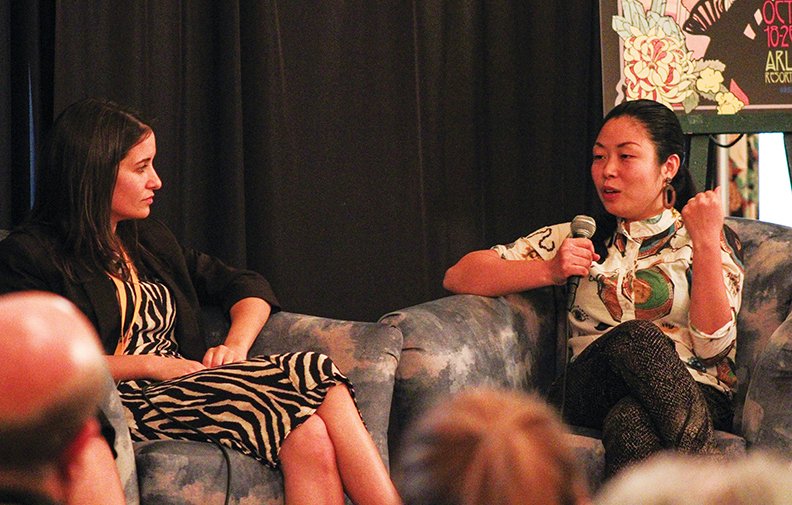 Directors Nanfu Wang, "One Child Nation," right, and Waad Al-Kateab, "For Sama," talk about "Filming in High-Risk Situations, Politics, and More" on Saturday. - Photo by Jami Smith of The Sentinel-Record story.lead_photo.caption