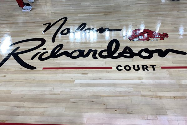 The logo for Nolan Richardson Court at Bud Walton Arena is shown Sunday, Oct. 20, 2019, prior to a game between Arkansas and Arkansas-Little Rock in Fayetteville.