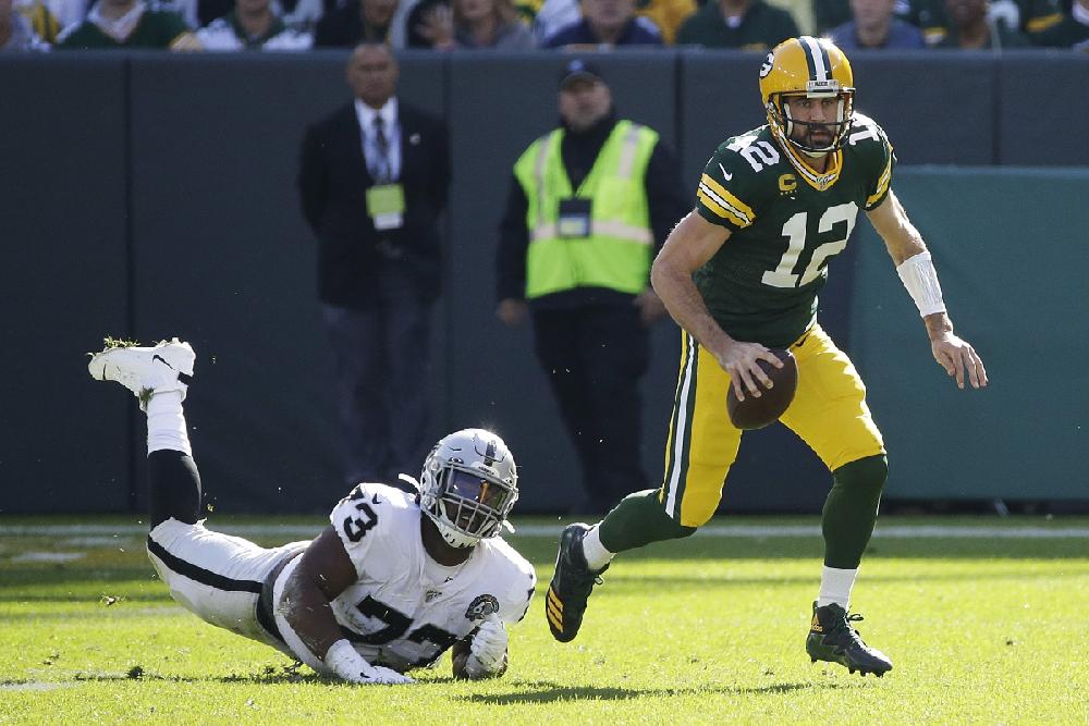 NFL - FINAL: Green Bay Packers score five TDs to improve