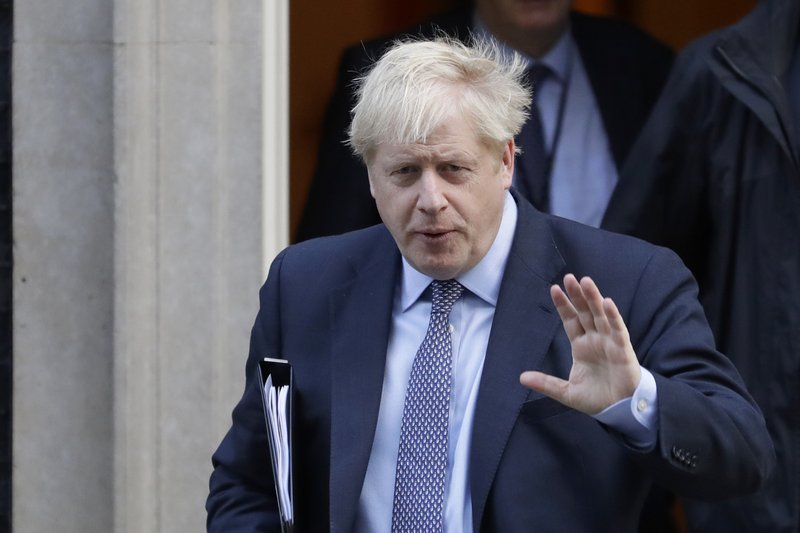 British Prime Minister Boris Johnson leaves 10 Downing Street, to go to the Houses of Parliament on Saturday in London. - AP Photo/Kirsty Wigglesworth