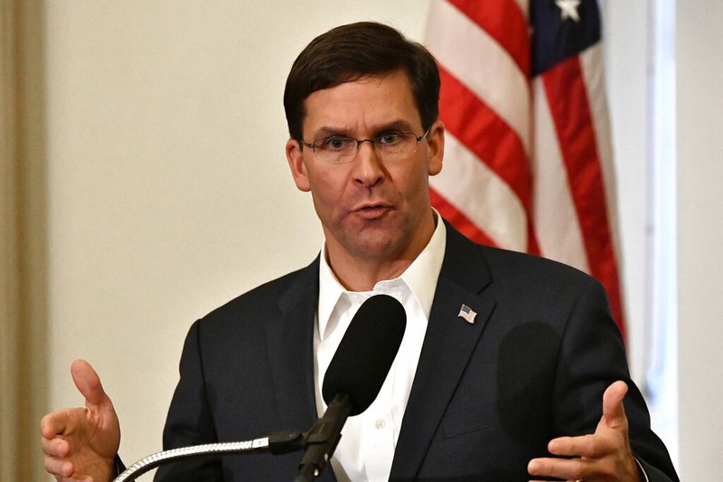 FILE - In this Friday, Oct. 4, 2019 file photo, Defense Secretary Mark Esper speaks to a gathering of soldiers at the University Club at the University of Louisville in Louisville, Ky. (AP Photo/Timothy D. Easley, File)