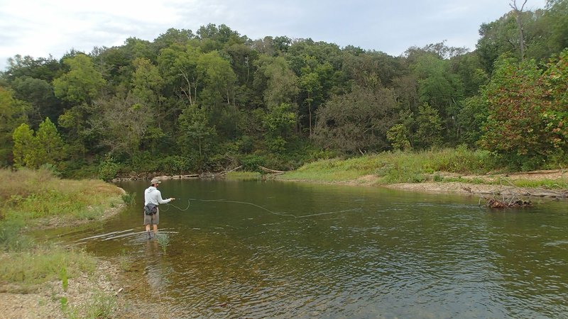 NWA Democrat-Gazette/FLIP PUTTHOFF Fly fishing is the method of choice for Daniel Roberts of Springdale in his quest to catch smallmouth and largemouth bass from the Ozarks' streams. Roberts wades Little Sugar Creek Sept. 25 2019 near Pineville, Mo.