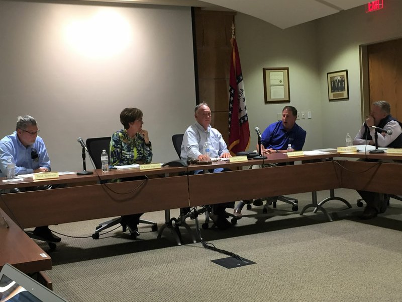 NWA Democrat-Gazette/DAVE PEROZEK President Evelyn Jorgenson, second from left, and members of the Northwest Arkansas Community College Board of Trustees discuss the possibility of establishing a cross country team during the board's meeting on Monday, Oct. 21, 2019.