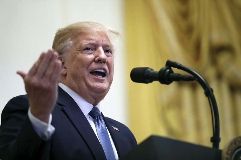  In this Friday, Oct. 4, 2019 file photo, President Donald Trump speaks during the Young Black Leadership Summit at the White House in Washington. An appeal panel is poised to hear Trump's lawyers argue that New York state investigators should not be permitted to see his tax returns. (AP Photo/Carolyn Kaster, File)