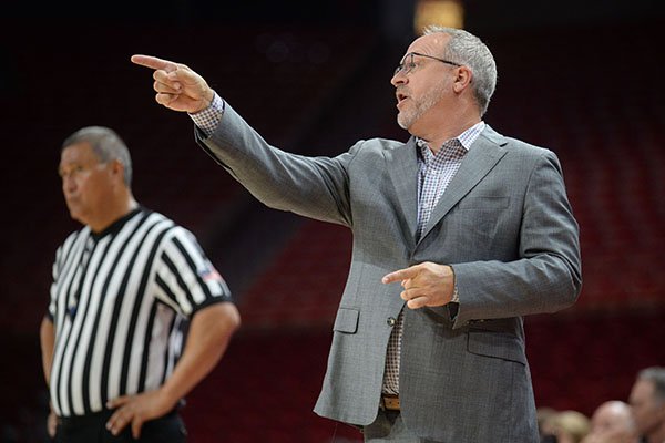 Arkansas coach Mike Neighbors directs his players against Pittsburg State Thursday, Oct. 24, 2019, during the second half of play in Bud Walton Arena. 