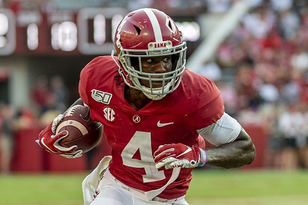 Alabama wide receiver Jerry Jeudy (4) gets loose against Ole Miss during the second half of an NCAA college football game, Saturday, Sept. 28, 2019, in Tuscaloosa, Ala. (AP Photo/Vasha Hunt)