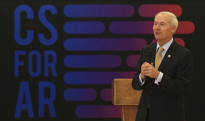  Gov. Asa Hutchinson is shown speaking at Sylvan Hills Middle School in this file photo.