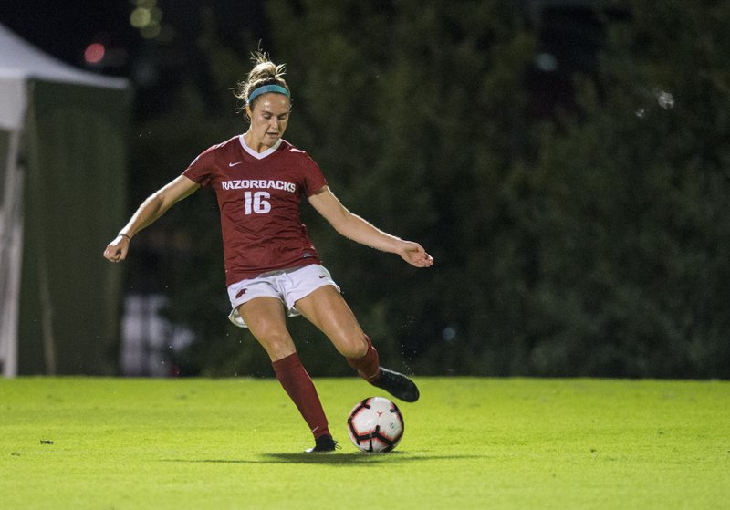 Anna Podojil, Arkansas forward, passes the ball in the first half vs Vanderbilt Thursday, Sept. 26, 2019, at Razorback Field in Fayetteville.