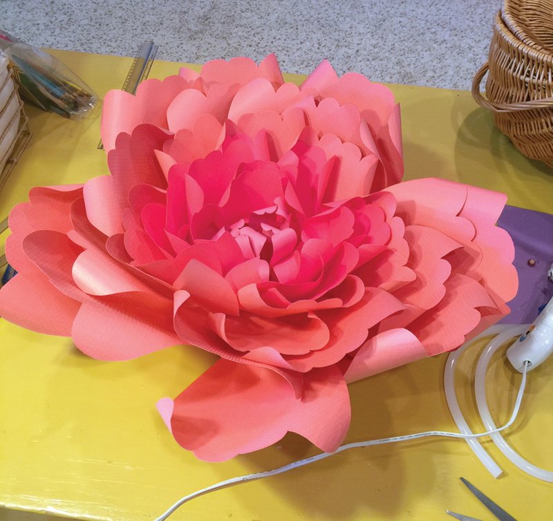 Paper Art: El Dorado native Kathy Stanley will return home to teach a one-day class on creating giant paper flowers like the one pictured here. The class is Nov.16.