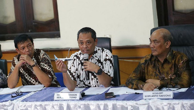 Investigator Nurcahyo Utomo at a news conference held Friday in Jakarta along with Soerjanto Tjahjono (right), chairman of Indonesia’s National Transportation Safety Committee, cites nine factors that he said helped lead to the Lion Air jet crash that killed 189 people a year ago. 