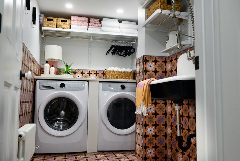 Jessica Centella and Kiera Kushlan of Residents Understood designed a cool laundry space as part of a total basement renovation, using encaustic porcelain tiles and a farmhouse-style cast-iron sink. (Washington Post photo by Sarah L. Voisin.)