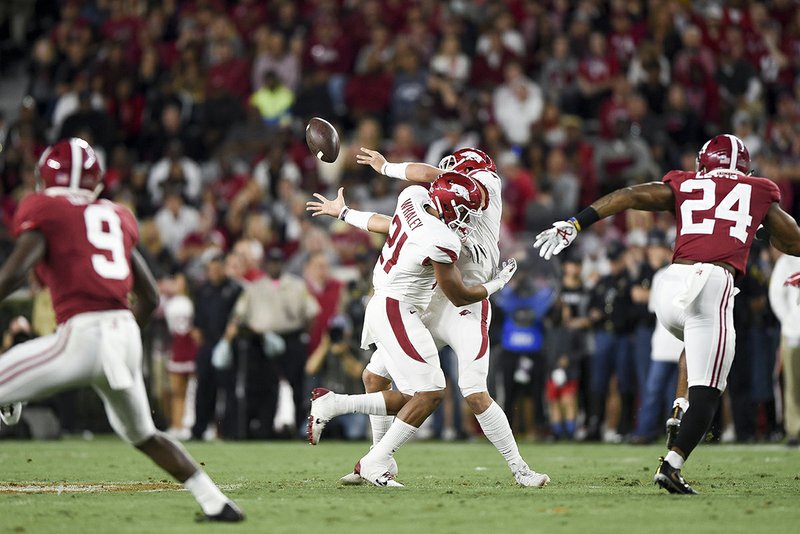 No. 1 Tide crush error-prone Hogs