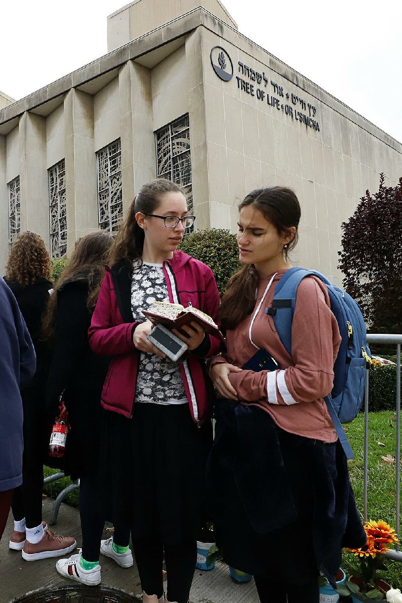 Students from a Jewish school gather Sunday outside the Tree of Life synagogue in Pittsburgh. 