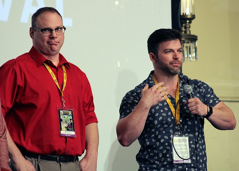 Jerry Peacock, left, and Jonathan Carroll react to questions from the audience after the world premiere of the documentary "Quest of the Muscle Nerd" on Saturday during the final events at the Hot Springs Documentary Film Festival at the Arlington Resort Hotel & Spa. - Photo by Jami Smith of The Sentinel-Record