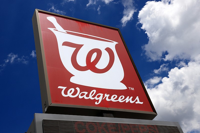 FILE - This June 25, 2019, file photo shows a sign outside a Walgreens Pharmacy in Pittsburgh. (AP Photo/Gene J. Puskar, File)