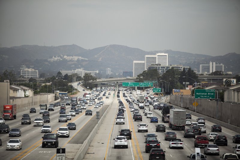 Traffic flows recently on a freeway in Los Angeles. In September, Trump announced that his administration would seek to revoke California’s authority to set emissions standards that are stricter than federal ones. 