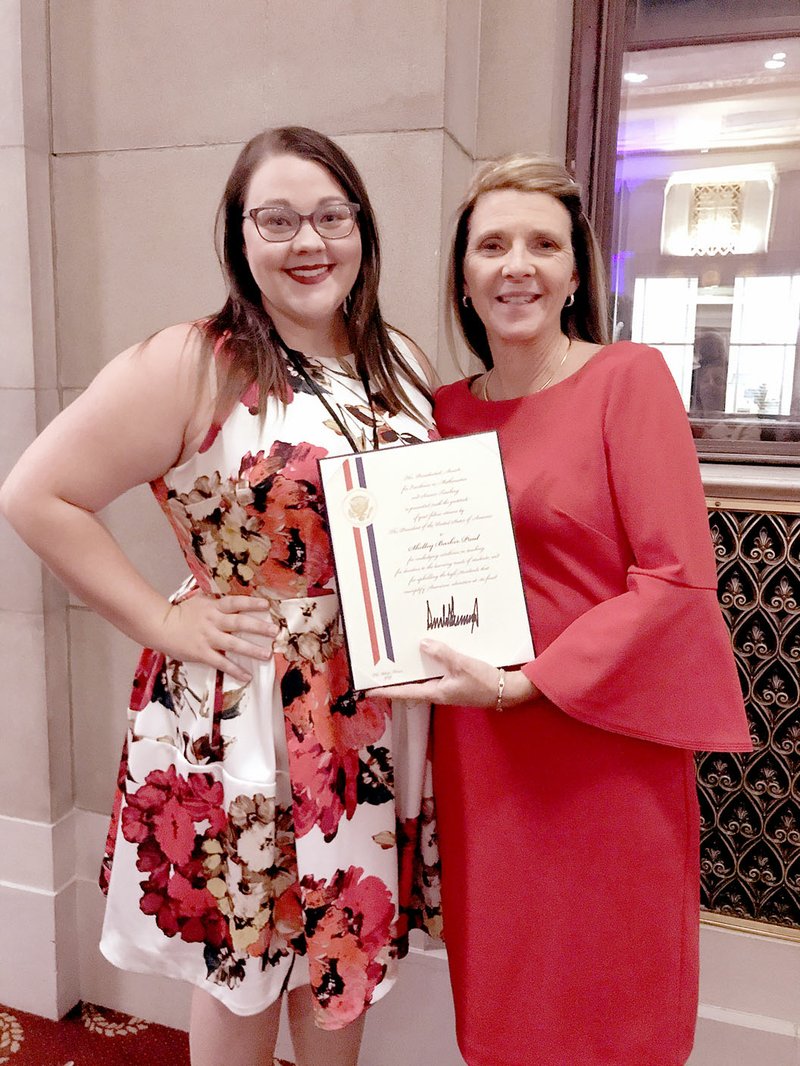 PHOTO SUBMITTED Shelley Paul (right) and her daughter, Emily Paul, are pictured at the Department of the Interior just after Shelley received her award, which included a certificate signed by the president.