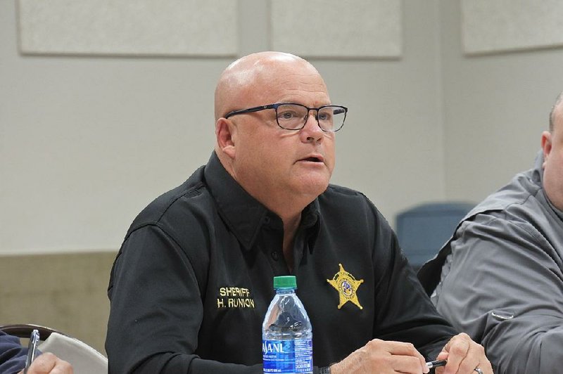 Sebastian County Sheriff Hobe Runion speaks during the Sebastian County Intergovernmental Cooperation Council meeting on October 31.  
