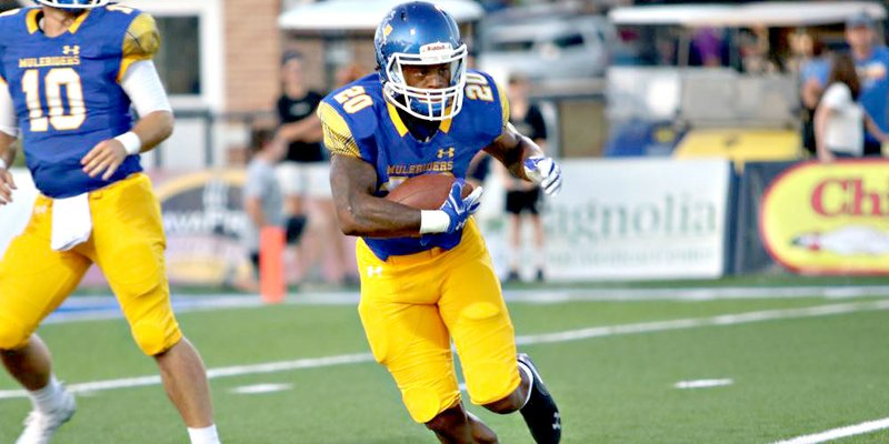  Southern Arkansas’ Deno Rogers (97), sophomore from Camden Fairview, makes a tackle. (Photo by Mike Jones)