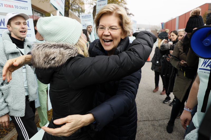 Democratic presidential candidate Sen. Elizabeth Warren greets supporters before the Iowa Democratic Party's Liberty and Justice Celebration, Friday, Nov. 1, 2019, in Des Moines, Iowa. (AP Photo/Charlie Neibergall)