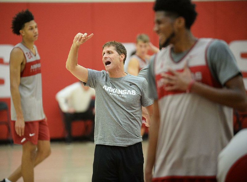 Arkansas Coach Eric Musselman directs his players during practice recently in Fayetteville. Musselman, who coached at Nevada for the past four seasons, replaces Mike Anderson, who coached the Razorbacks the past eight seasons. 