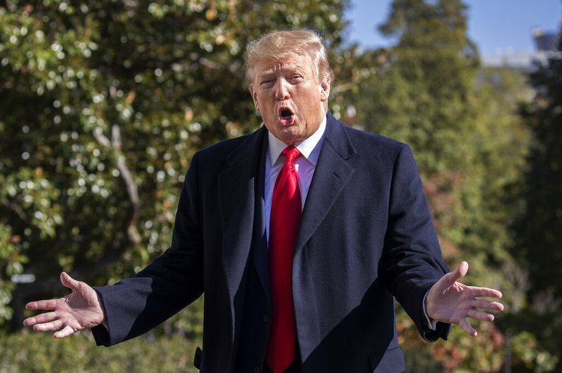 President Donald Trump speaks to reporters upon arrival at the White House in Washington, Sunday, Nov. 3, 2019. 