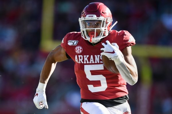 Arkansas running back Rakeem Boyd (5) carries the ball for a 52-yard touchdown during a game against Mississippi State on Saturday, Nov. 2, 2019, in Fayetteville. 