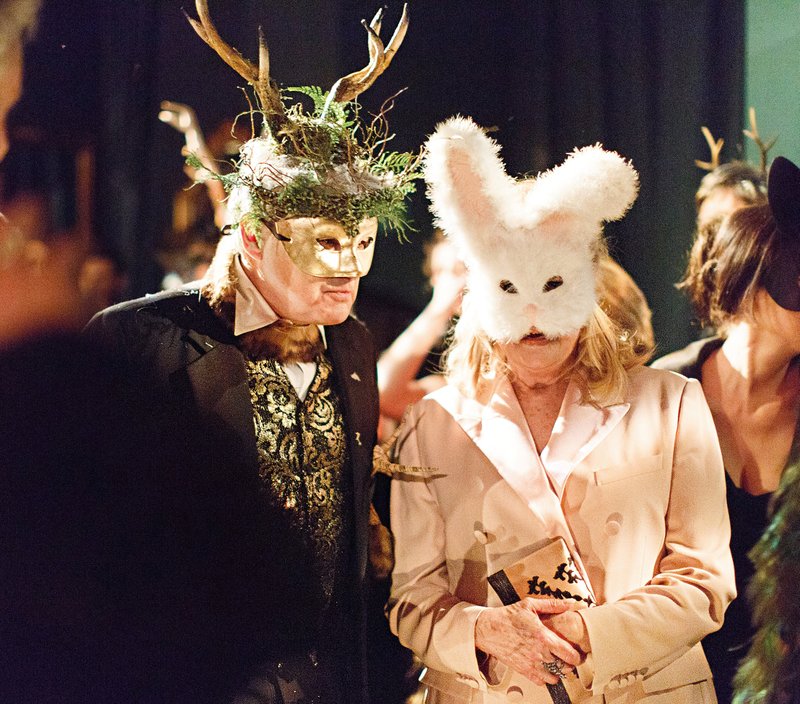 Bronson van Wyck Sr., the event planner's father, escorts family friend Candice Bergen at the Bal des Sauvages in 2015. Bergen wore the same pink bunny mask to this party that she wore to Truman Capote's Black and White Ball in 1966. She told van Wyck that the mask had been waiting for this party in the top of her closet since 1966. (Photo by Allan Zepeda, special to the Democrat-Gazette)