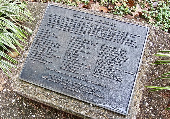 A plaque at Cadron Settlement Park lists the names of Cherokee victims of cholera who died there while being transported west. (Photo by Marcia Schnedler, special to the Democrat-Gazette)