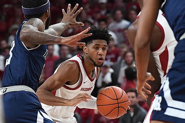 Arkansas guard Isaiah Joe (1) drives with the ball during a game against Rice on Tuesday, Nov. 5, 2019, in Fayetteville. 