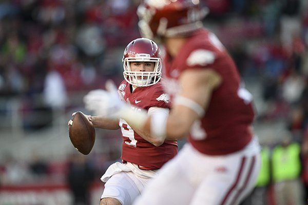 Arkansas quarterback John Stephen Jones looks to throw a pass during a game against Mississippi State on Saturday, Nov. 2, 2019, in Fayetteville.
