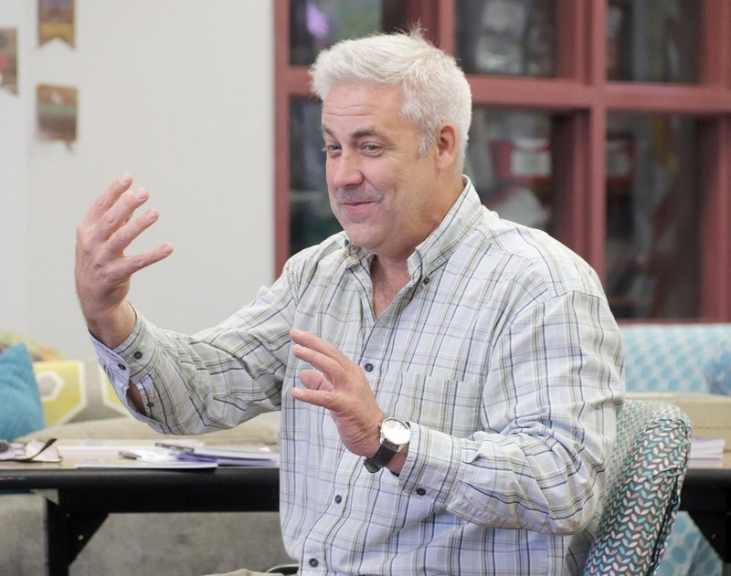 LYNN KUTTER ENTERPRISE-LEADER Children's author Michael Finklea of Dallas, Texas, tells a story to fourth graders at Farmington Middle School.