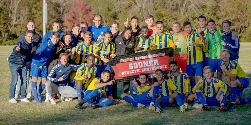 Photo courtesy of JBU Sports Information John Brown University men's soccer players celebrate after defeating Southwestern Christian (Okla.) to win the Sooner Athletic Conference regular season championship on Saturday afternoon at Alumni Field. It's JBU's first regular season league title in 25 years in the league.