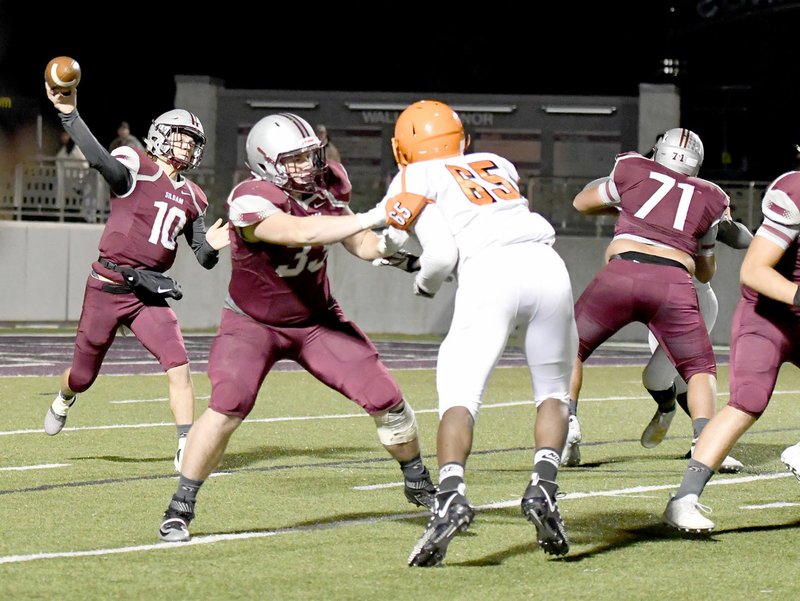 Bud Sullins/Special to the Herald-Leader Siloam Springs senior quarterback Taylor Pool, No. 10, throws a pass against Little Rock Hall during last Friday's game at Panther Stadium.