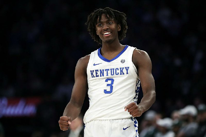 Kentucky guard Tyrese Maxey reacts after making a basket during the second half of an NCAA college basketball game against Michigan State early Wednesday, Nov. 6, 2019, in New York. (AP Photo/Adam Hunger)