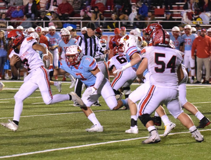 RICK PECK/SPECIAL TO MCDONALD COUNTY PRESS McDonald County running back Junior Teriek (7) runs for a nice gain during the Mustangs' 49-14 loss to Webb City on Friday at Webb City High School.