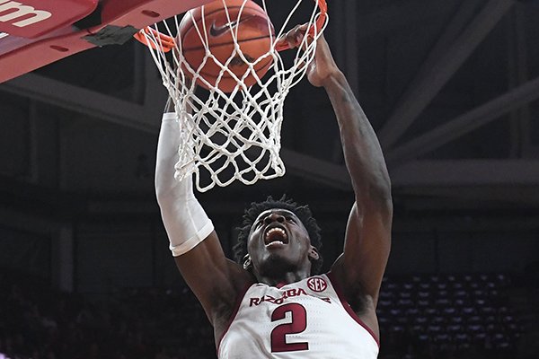 Arkansas forward Adrio Bailey dunks the ball during a game against Rice on Tuesday, Nov. 5, 2019, in Fayetteville. 