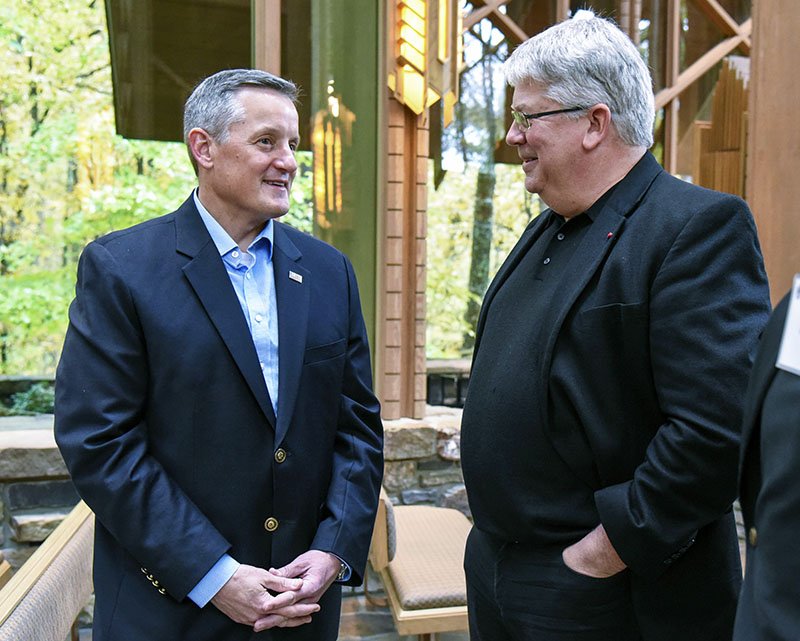 Congressman Bruce Westerman, left, speaks to the dean of the Faye Jones School of Architecture + Design, Peter MacKeith, ahead of a special announcment program inside Anthony Chapel at Garvan Woodland Gardens on Thursday. - Photo by Grace Brown of The Sentinel-Record