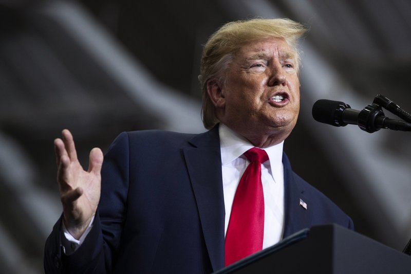 In this Nov. 6, 2019, file photo, President Donald Trump speaks during a campaign rally at the Monroe Civic Center in Monroe, La. A New York judge on Thursday, Nov. 7 ordered Trump to pay about $2 million to an array of charities to resolve a lawsuit alleging he misused his own charitable foundation to further his political and business interests. (AP Photo/Evan Vucci, File)