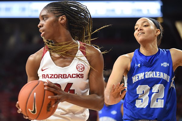 Arkansas forward Taylah Thomas (24) pulls down a rebound during a game against New Orleans on Friday, Nov. 8, 2019, in Fayetteville. Thomas recorded a career-high 21 rebounds, one shy of the school record for a single game. 