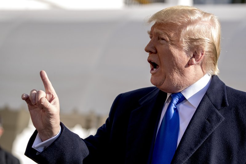 President Donald Trump tells a reporter to be quiet as he speaks on the South Lawn of the White House in Washington, Friday, Nov. 8, 2019, before boarding Marine One for a short trip to Andrews Air Force Base, Md. and then on to Georgia to meet with supporters. (AP Photo/Andrew Harnik)
story.lead_photo.caption