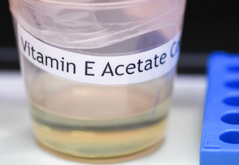 This Monday, Nov. 4, 2019 photo shows a vitamin E acetate sample during a tour of the Medical Marijuana Laboratory of Organic and Analytical Chemistry at the Wadsworth Center in Albany, N.Y. On Friday, Nov. 8, 2019, the Centers for Disease Control and Prevention in Atlanta said fluid extracted from 29 lung injury patients who vaped contained the chemical compound in all of them. (AP Photo/Hans Pennink)